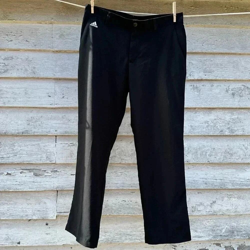Adidas golf pants black in great condition size 34X32